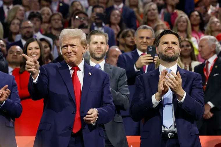 Former President Donald Trump and his running mate JD Vance are seen during the first night of the Republican National Convention in Milwaukee on Monday, July 15, 2024.