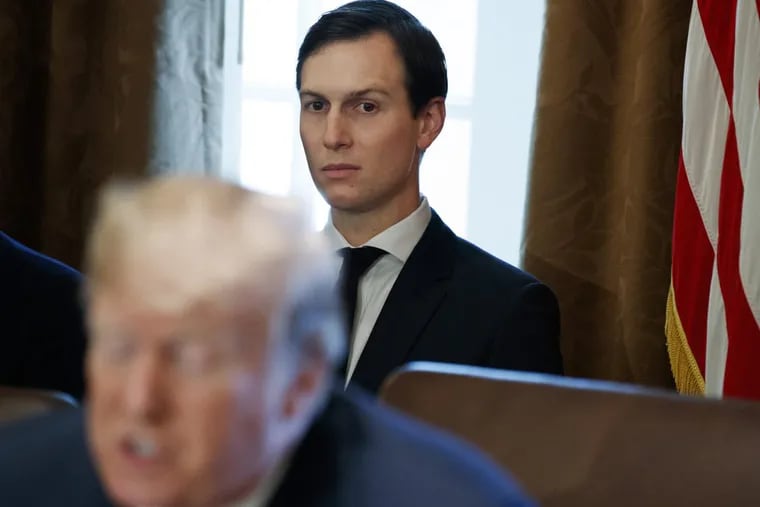 White House senior adviser Jared Kushner listens as his father-in-law President Donald Trump speaks during a cabinet meeting at the White House in Washington last November.
