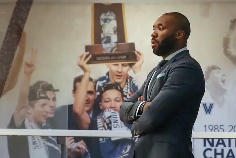 Villanova’s new men’s basketball head coach Kyle Neptune waits behind the scenes for the start of a press conference at the Finneran Pavilion in Villanova in April.