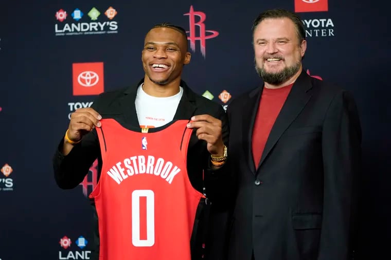 Last summer as the Houston Rockets general manager, Daryl Morey (right) acquired Russell Westbrook from the Oklahoma City Thunder for guard Chris Paul, two protected first-round picks, and other draft considerations.