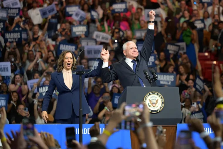 Vice President Kamala Harris, Democratic nominee for president, and her running mate, Minnesota Gov. Tim Walz, address a rally last week at the Liacouras Center in Philadelphia.