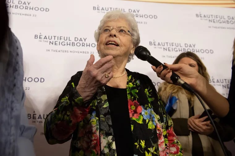 Joanne Rogers, center, wife of Fred Rogers, attends "A Beautiful Day in the Neighborhood" movie premiere in 2019.