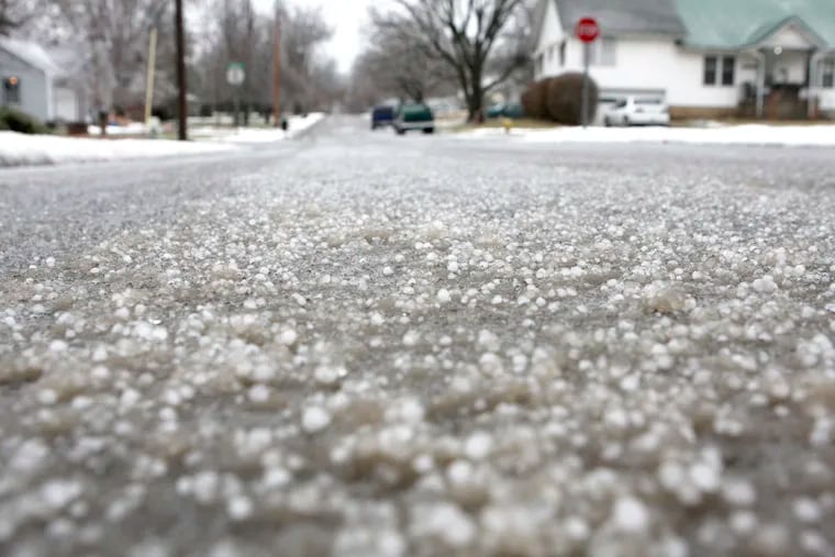 FILE - Hail stones. Okay, we didn't get nearly that much, but the National Weather Service reported hail fell Sunday, July 14, and counted it as a trace amount of snow for the day. That broke a record of 0.0 inches of snow stretching to 1870.