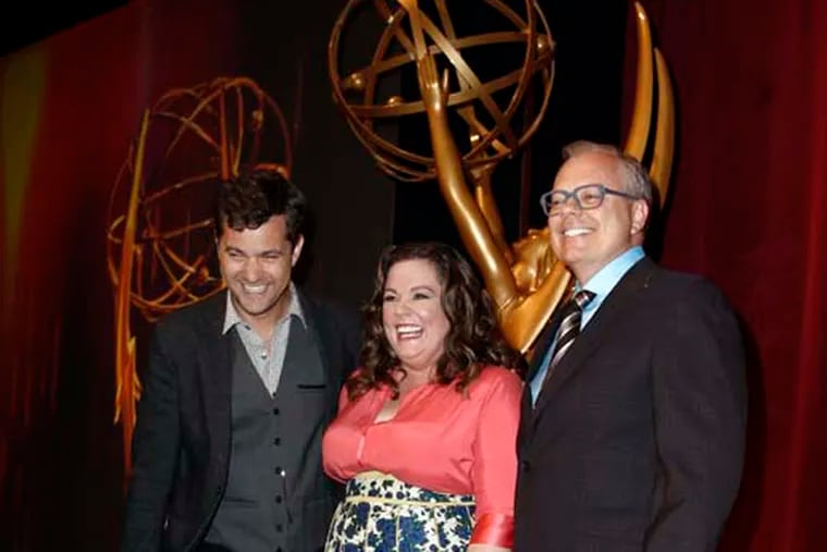Actors Melissa McCarthy, center, Joshua Jackson, left, and John Shaffner, chairman of the Academy of Television Arts and Sciences,  pose together after announcing nominations for the 63rd Primetime Emmy Awards at the Academy of Television Arts & Sciences in Los Angeles, Thursday, July 14, 2011. The show will be held on Sept. 28 at Nokia Theater in Los Angeles. (AP Photo/Matt Sayles)