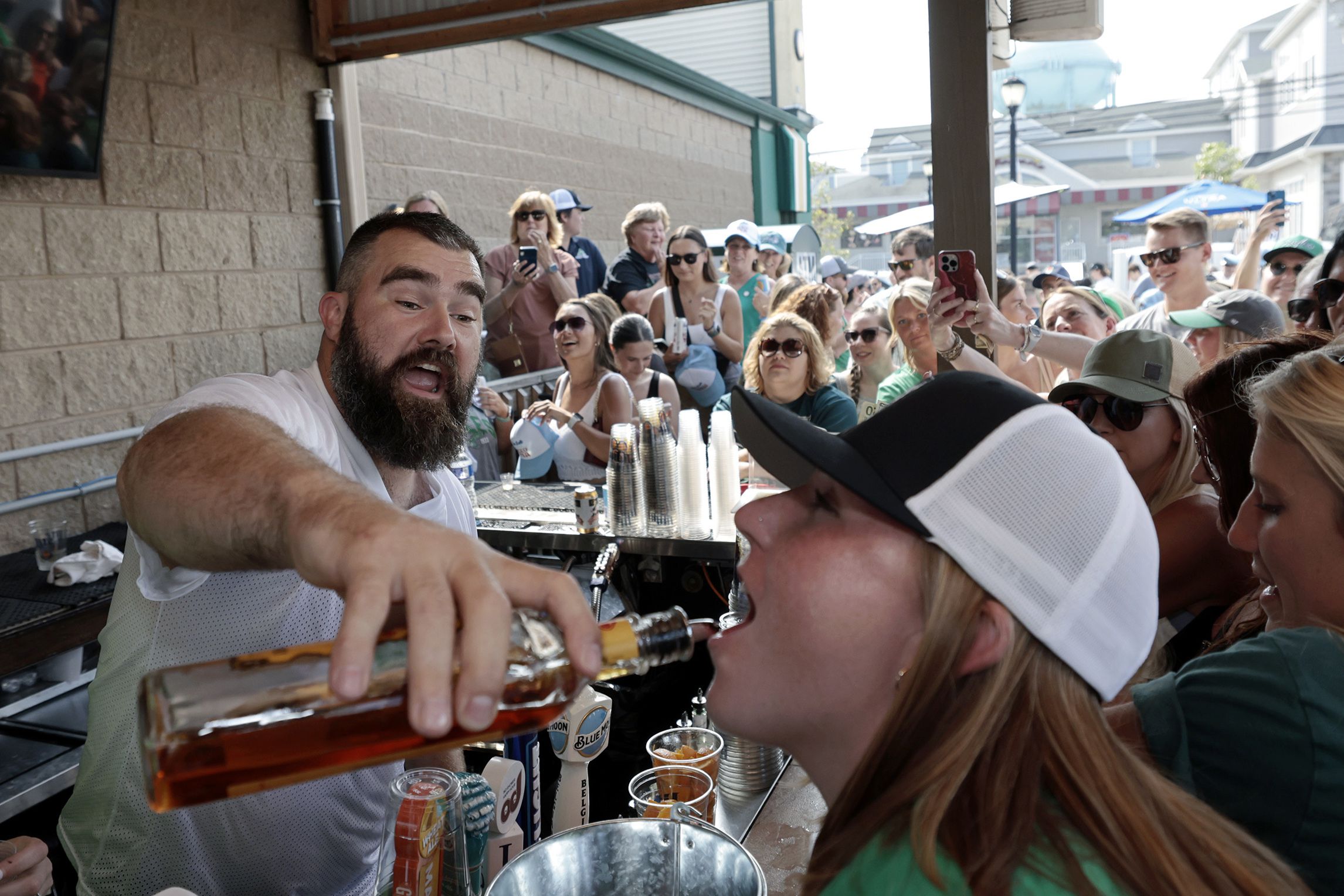 Jason Kelce celebrity bartending at shore for Eagles Autism Challenge