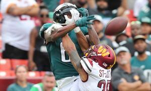 Eagles' DeVonta Smith glides like Batman as his acrobatic catches on a  career day sink the Commanders