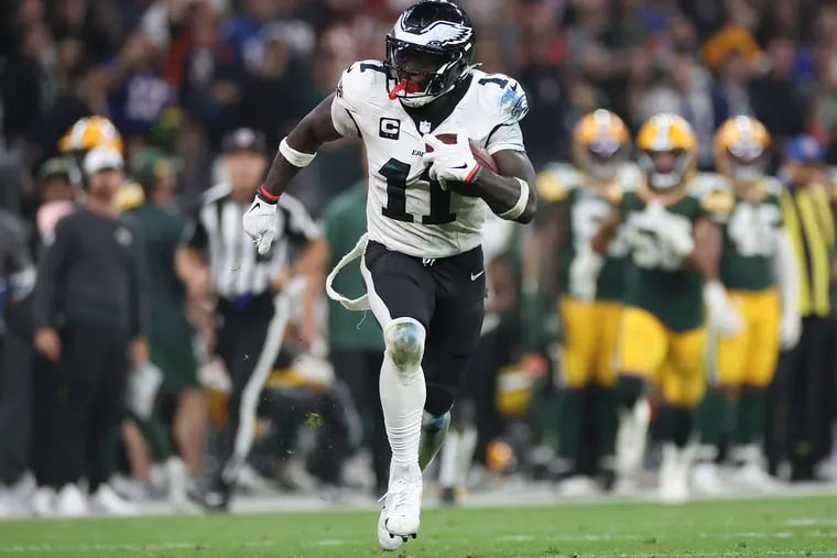 Eagles wide receiver A.J. Brown runs for a 67-yard touchdown on a catch against the Green Bay Packers in the opener.