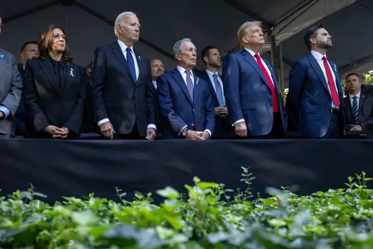 From left, Democratic presidential nominee Vice President Kamala Harris, President Joe Biden, Michael Bloomberg, Republican presidential nominee former President Donald Trump and Republican vice presidential nominee Sen. JD Vance, R-Ohio, attend the 9/11 Memorial ceremony on the 23rd anniversary of the Sept. 11, 2001 attacks, Wednesday, Sept. 11, 2024, in New York. (AP Photo/Yuki Iwamura)