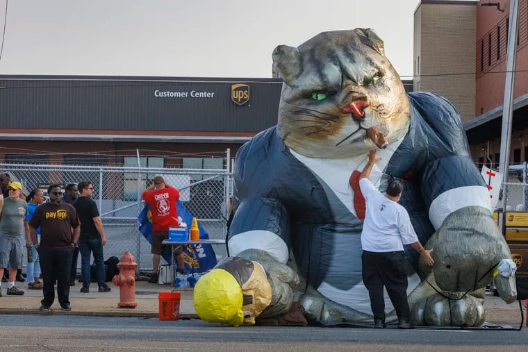 A Fat Cat is inflated in front of the UPS Customer Center on Oregon Avenue on July 20, 2023, as UPS Teamsters prepared for a rally to inform management of their intention to strike on Aug. 1 if negotiations failed. They ended up reaching a contract in late July.