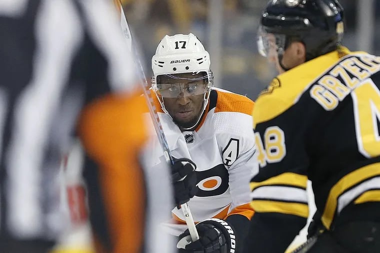 A Black Hockey Player Faced Racial Taunts. Some Fans Aren't