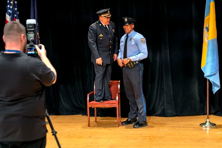 June 24, 2024: Police Commissioner Kevin Bethel and officer Julio Rodriguez-Perez (right).