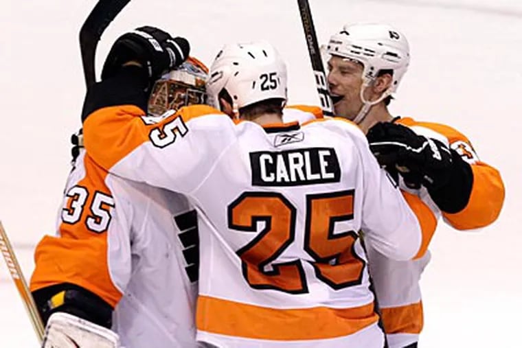 The Flyers clinched a playoff berth with their 3-2 shootout win over the Stars on Saturday night. (AP Photo)