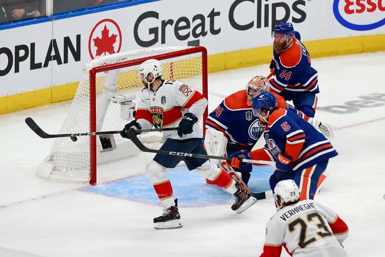 Stuart Skinner #74 of the Edmonton Oilers makes a save as Sam Reinhart #13 of the Florida Panthers looks for a rebound during Game Six of the 2024 Stanley Cup Final at Rogers Place on June 21, 2024 in Edmonton, Alberta. (Photo by Jeff Vinnick/Getty Images)