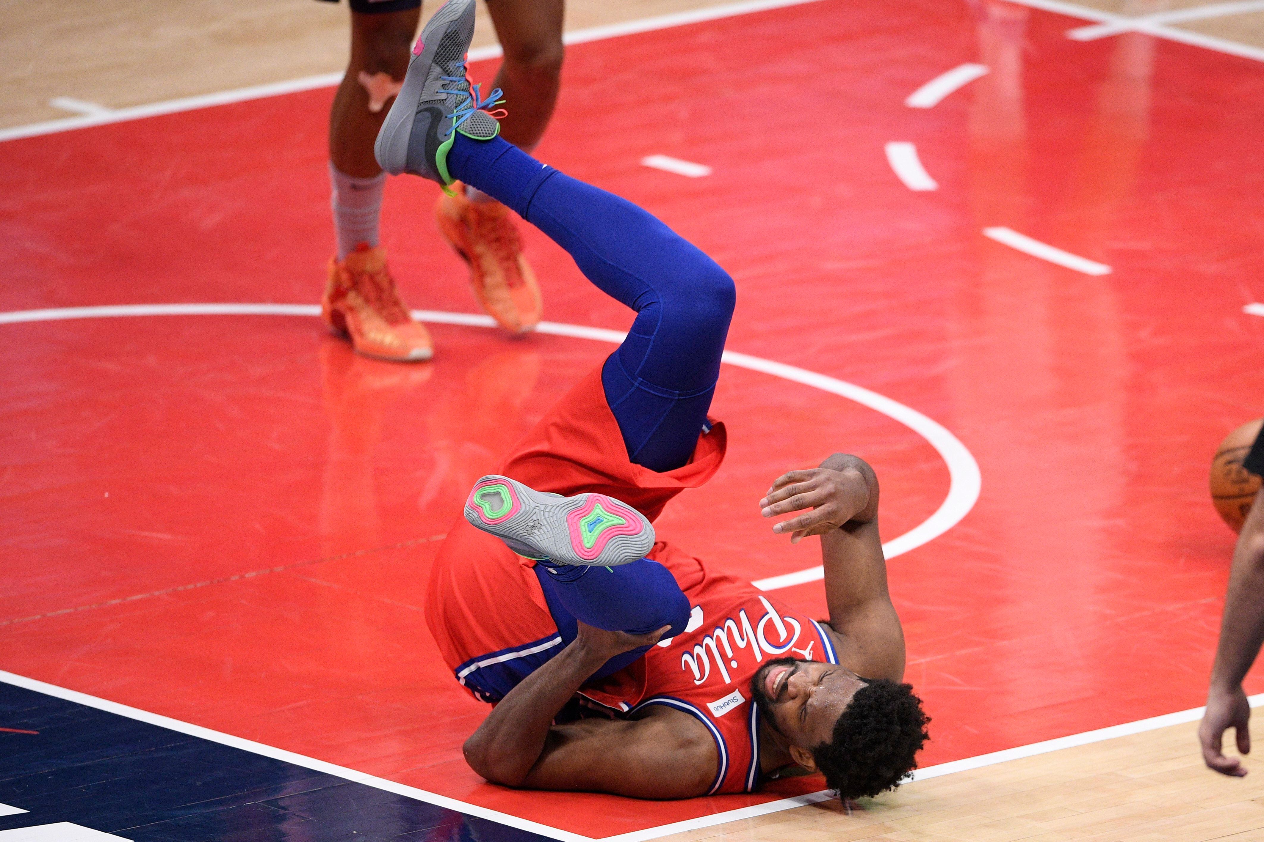 76ers star Joel Embiid sits Friday because of sore right knee