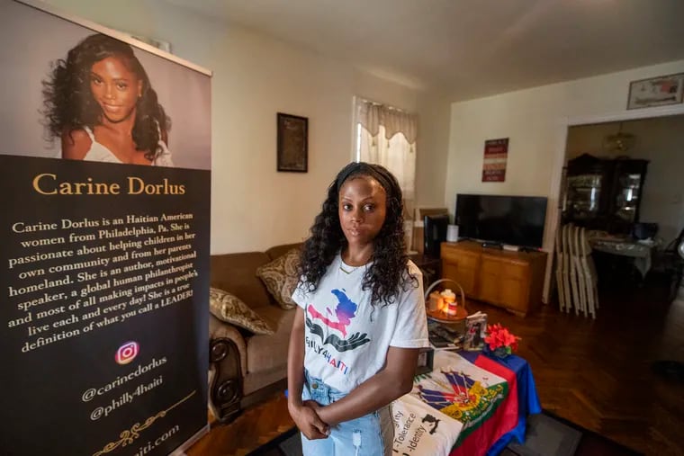 Carine Dorlus poses for a photo at her home on Tuesday, August 17, 2021. Dorlus, founded Philadelphia for Haiti and is working to help victims of the earthquake.