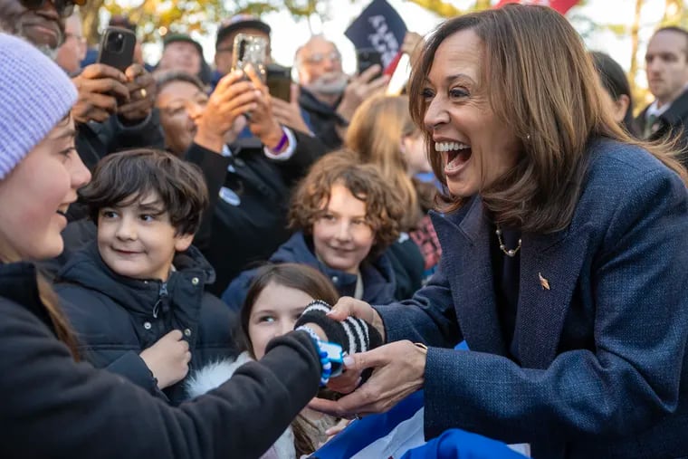 Vice President Kamala Harris greets children in the crowd of supporters after speaking at a Republicans for Harris event in Washington Crossing on Wednesday, Oct. 16, 2024.