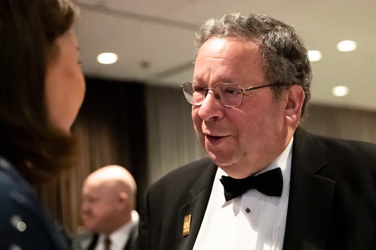 Comcast Senior Vice President David Cohen socializes during cocktail hour at the New York Hilton Midtown before the start of the Pennsylvania Society’s 121st Annual Dinner on Saturday, Dec. 07, 2019. Cohen announced on Thursday that he is stepping away from his operational roles at the company.