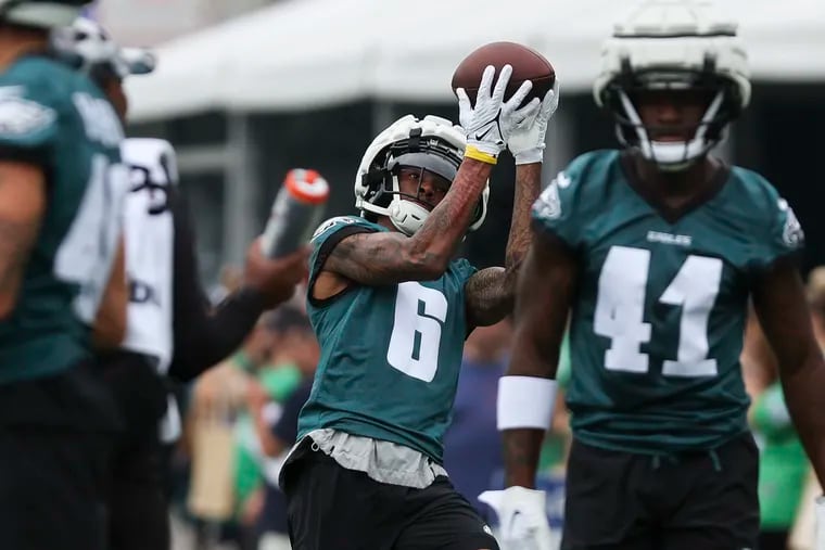 Eagles wide receiver DeVonta Smith making a catch during the first day of training camp at the NovaCare Complex.