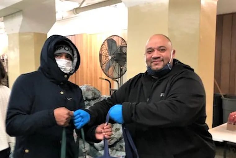 Truck driver Angel Rodriguez (right) is based at the Hunts Point terminal in the Bronx for A. Duie Pyle, a 4,000-worker trucking firm based in West Chester, Pa. He was one of hundreds furloughed after the March coronavirus shutdowns.