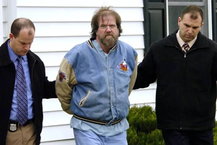 Earl Bradley is escorted into court in Georgetown, Del. He practiced at Knights and Red Lion Roads in the Northeast before moving to Delaware in 1995, a Pennsylvania official said.