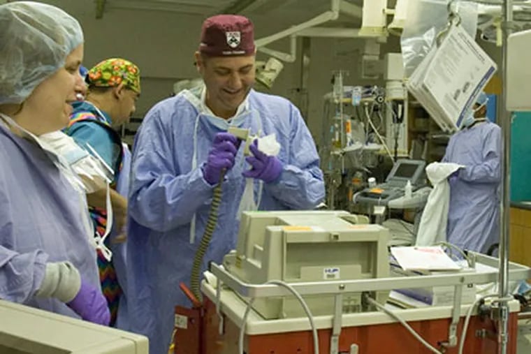 Dr. John Pryor, a surgeon at the University of Pennsylvania Trauma Center serving in Iraq, was killed Thursday when a mortar round hit near his living quarters. (Inquirer file photo)