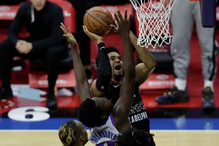 Sixers forward Tobias Harris (rear) said the team is taking the end of the season one game at a time.