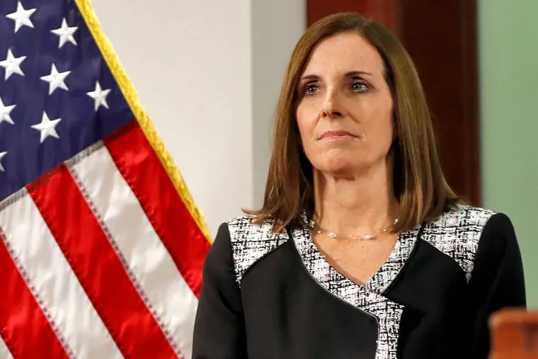 FILE - In this Dec. 18, 2018 file photo, then Rep. Martha McSally, R-Ariz., waits to speak during a news conference at the Capitol in Phoenix. Sen. Martha McSally, R-Ariz., the first female fighter pilot to fly in combat, says she was raped in the Air Force by a superior officer. (AP Photo/Matt York)