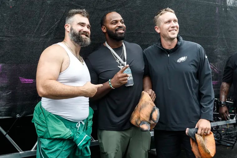 From left, former Eagles Jason Kelce, Fletcher, Cox and Nick Foles gather at Xfinity Live! on Monday.