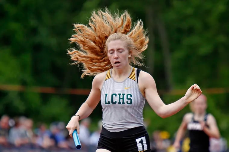 Taylor Connelly completes the final leg as Lansdale Catholic girls win the 4x800-meter relay in 10 minutes, 7.03 seconds at the Catholic League track and field championships Saturday, May 11, 2019 at Cardinal O'Hara. LOU RABITO / Staff