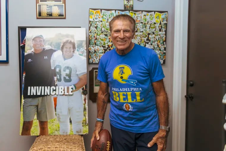 Former Eagles special teamer Vince Papale dons a Philadelphia Bell shirt at his home near Jupiter, Fla.
