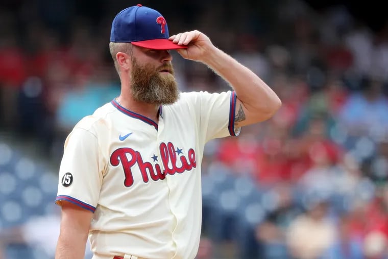 Phillies relief pitcher Archie Bradley reacts after giving up two runs in the eighth inning Sunday.