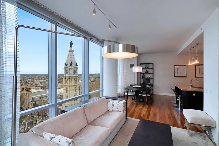 The top of Philadelphia's City Hall can be seen from this $1.35 million home for sale in the Residences at the Ritz-Carlton on South Penn Square. It is one of more than 70 homes in the Center City area that will be showcased Saturday, Oct. 21, in an open house event.