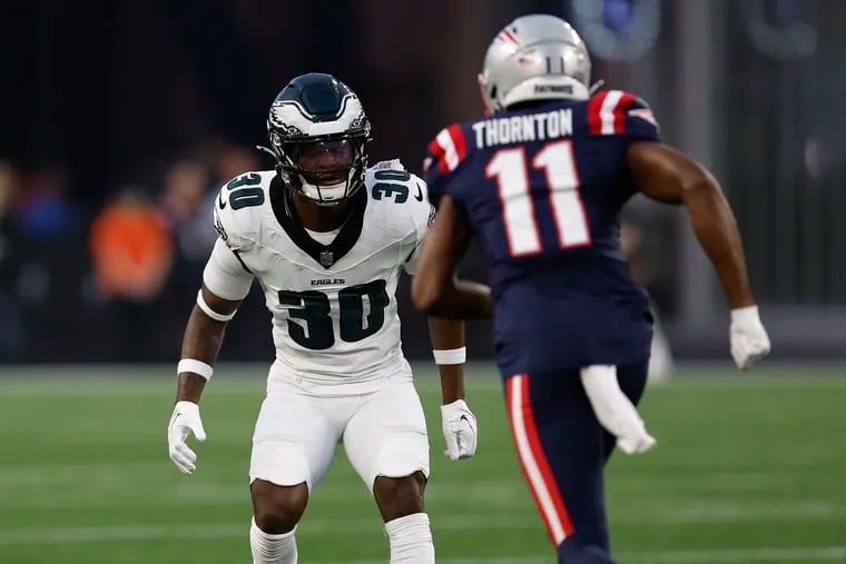 Cornerback Quinyon Mitchell, the Eagles' first-round pick, watches New England Patriots wide receiver Tyquan Thornton during their  preseason game on Aug. 15.