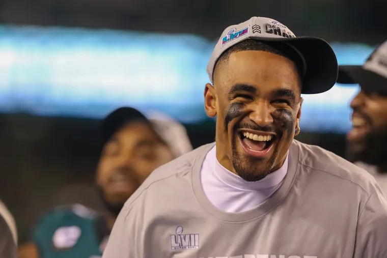 Eagles' Jalen Hurts went from unwanted to NFC champion. He has the cigar to  prove it.