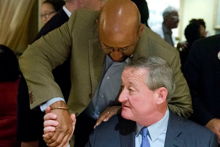 Statesmanships passing in the night: Outgoing Mayor Michael Nutter passes the baton in a friendly handshake with his successor Jim Kenney, at Relish restaurant in 2015.