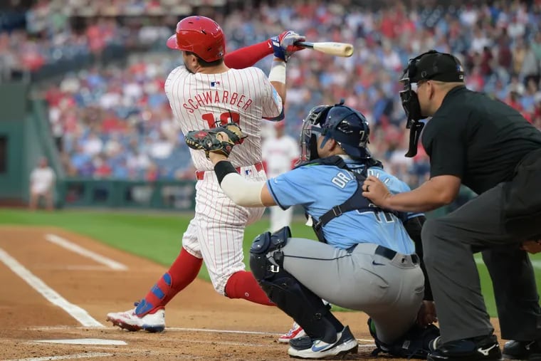 The Phillies’ Kyle Schwarber hits a leadoff home run against the Rays on Tuesday.