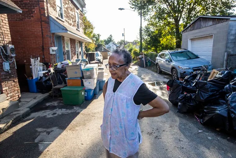 Irene Reese, 81, has spent all of her life except for six months living in homes on Cox Alley in Downingtown. She had to be rescued by a fire department boat when Ida hit.  On Saturday, she along with so many across the region continued cleaning up from the storm's ravages.