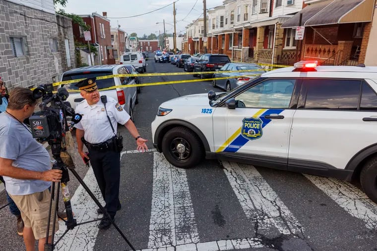 Philadelphia police Inspector D.F. Pace making statement to media gathered at scene of a fatal stabbing in West Philly.