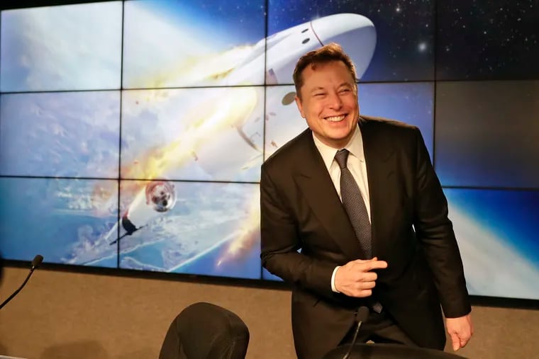 Elon Musk, CEO of SpaceX, speaks during a news conference at the Kennedy Space Center in Cape Canaveral, Fla., in 2020. With NASA's budget in flux, realizing the goal of going to Mars has fallen on billionaires like Musk, Jeff Bezos, and Richard Branson.