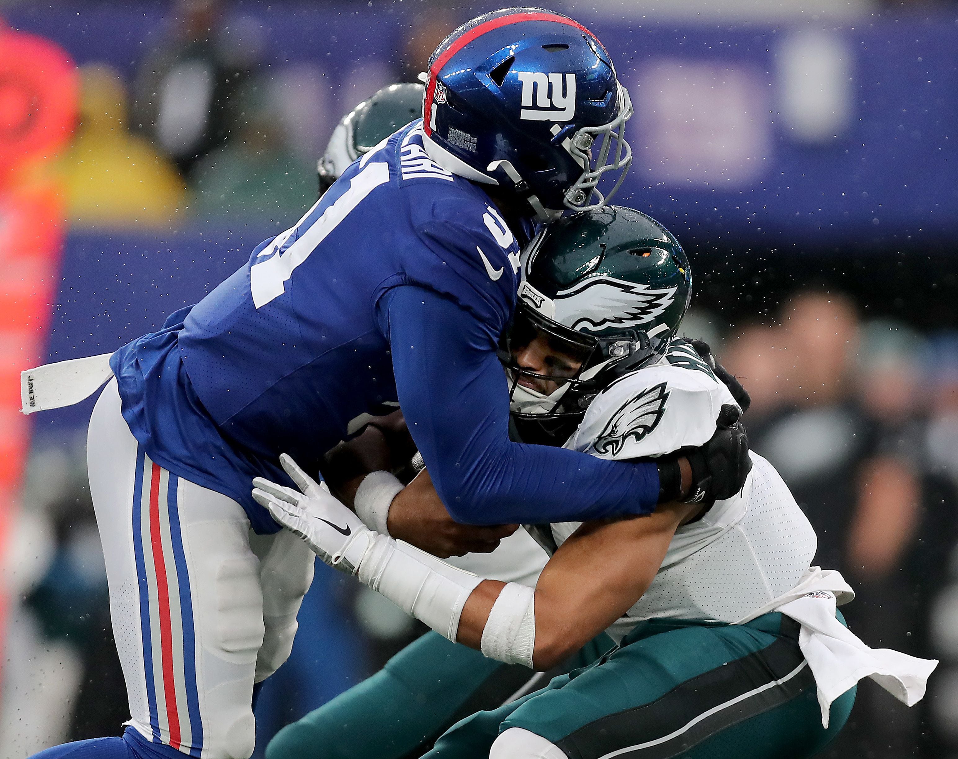 Eagles' Miles Sanders eclipsed 1,000 yards in a rout of the Giants