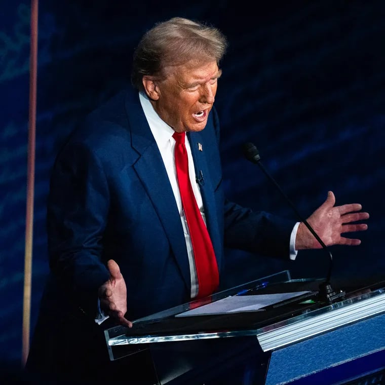 Former president Donald Trump speaks during Tuesday night's presidential debate in Philadelphia. MUST CREDIT: Demetrius Freeman/The Washington Post)