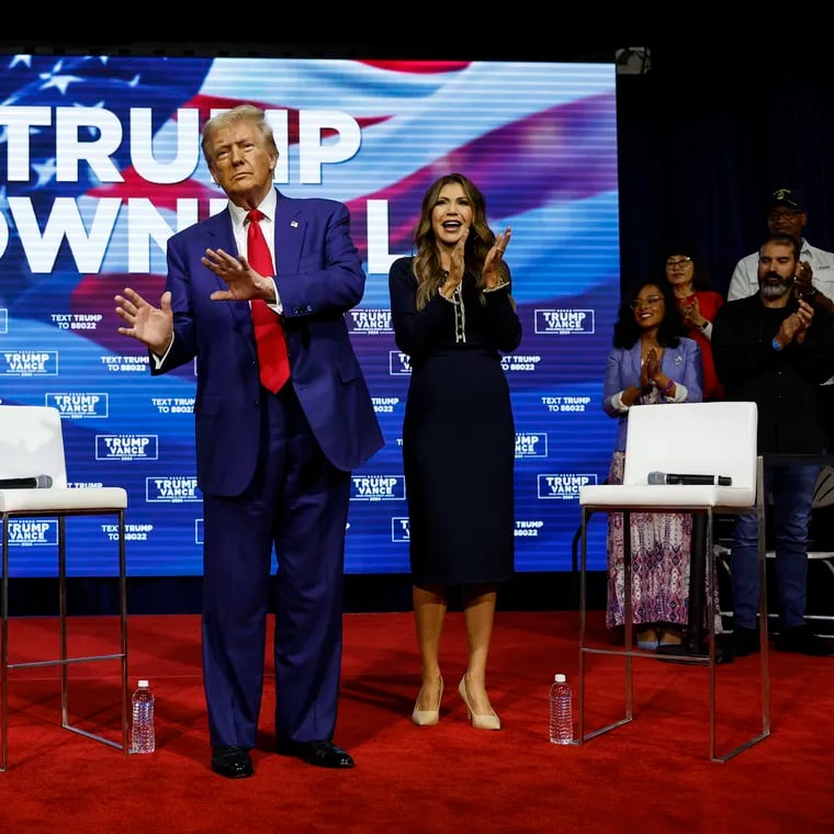 Former President Donald Trump stands for a town hall meeting with South Dakota Governor Kristi Noem in Oaks on Monday, Oct. 14.